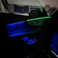 Audi Q8 4M RGB ambient lighting kit with dashboard and door LED strips, centre-console strip and four speaker light rings for 2019–2026 models
