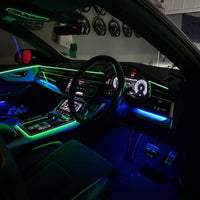 Audi Q8 4M RGB ambient lighting kit with dashboard and door LED strips, centre-console strip and four speaker light rings for 2019–2026 models
