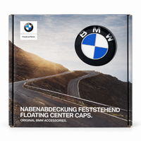 Set of four BMW 68mm floating wheel centre caps with blue and white emblems, black outer rings and chrome-effect edges in a presentation box
