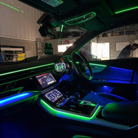 Audi Q8 4M RGB ambient lighting kit with dashboard and door LED strips, centre-console strip and four speaker light rings for 2019–2026 models
