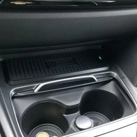 DHStyling black wireless phone charging pad with plug-and-play wiring for BMW 3 and 4 Series F-Series models from 2016 onwards