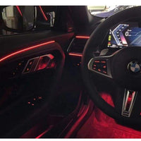 DHStyling BMW 2 Series G42 Coupé LHD ambient lighting kit with passenger and driver centre console trim strips, four door LED strips, two handle lights, two storage lights, four footwell lights, control modules and wiring.
