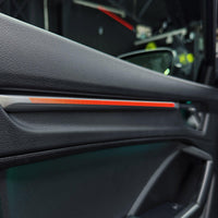 DHStyling Audi Q3 F3 2019–2024 RGB ambient lighting kit with dashboard LED strips, four illuminated door trims, footwell lights and wiring harnesses.
