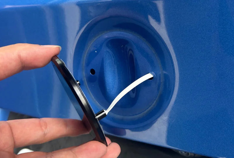 No-drill fitment — Cable routed through the opening